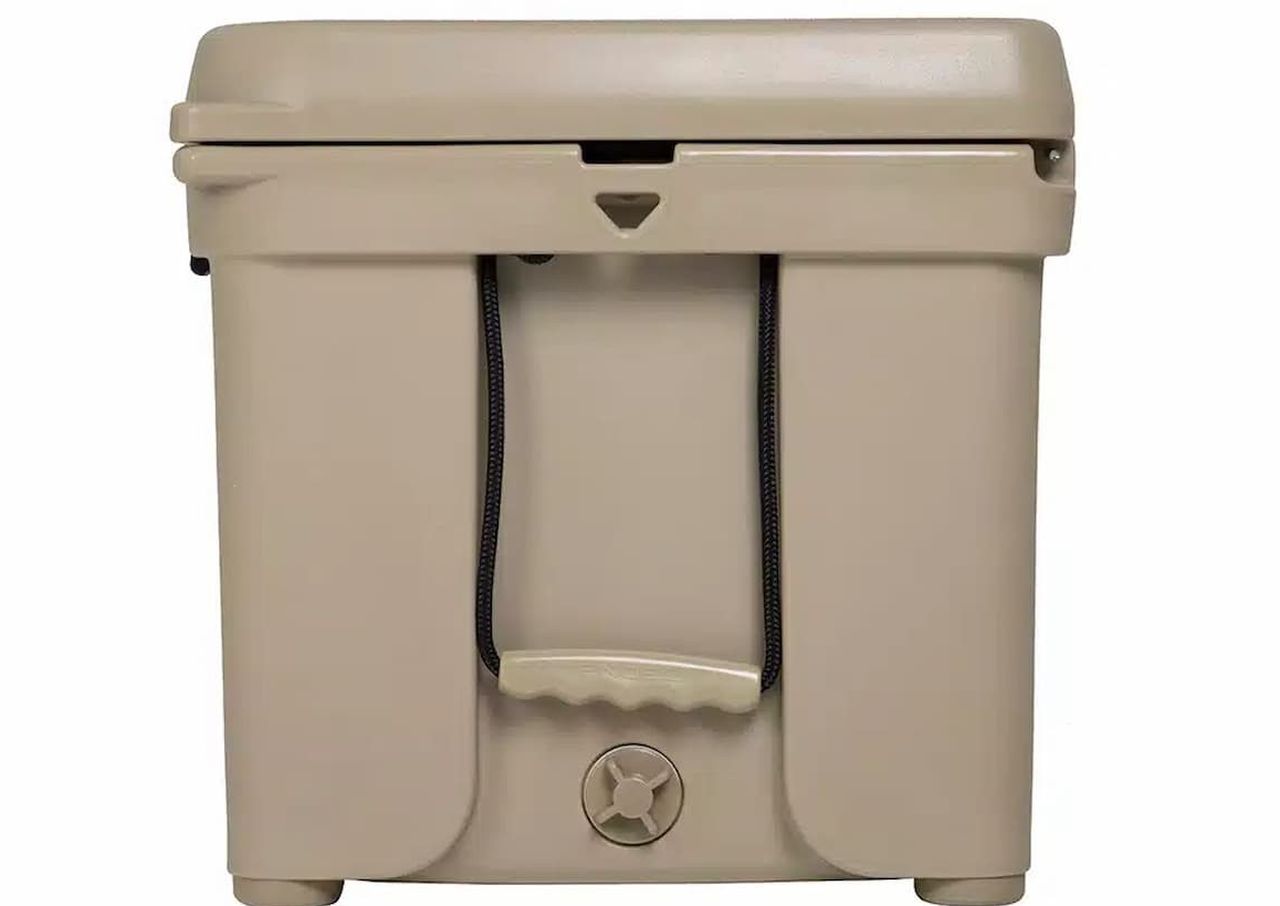 An Engel 123 beige hard-shell cooler with a black rope handle, featuring a lid with a locking mechanism and an embossed screw-type drain plug at the base.