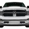 Front view of a white Ram pickup truck with a chrome grille and black accents.