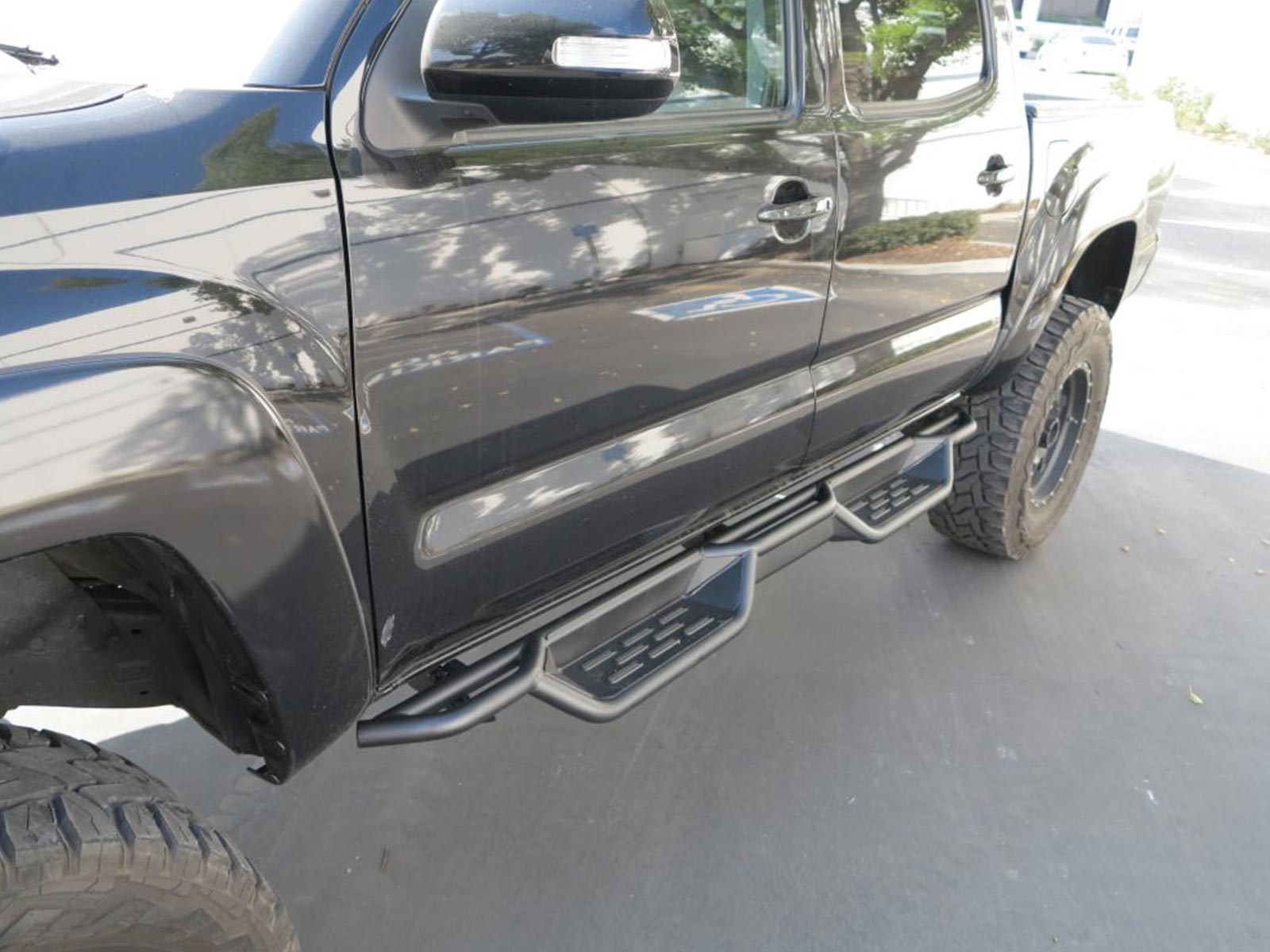 APS Black Drop Step Nerf Bars WB20NJE8B | RealTruck