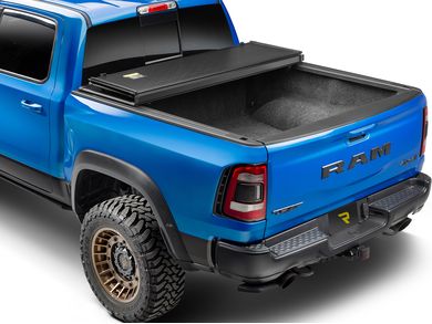 UnderCover Triad Hard Folding Tonneau Cover TR26021 | RealTruck